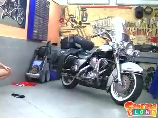 Desiring blonde teen with small tits stripping by the motor bike