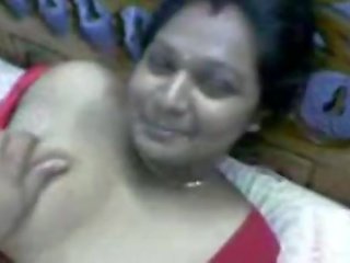 Indian captivating Desi Aunty In Red Dress